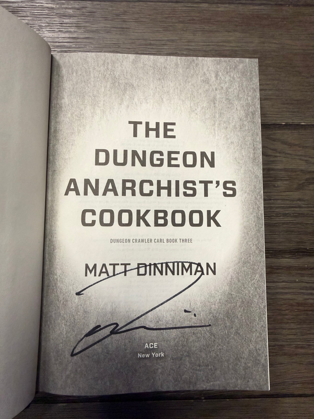 SIGNED The Dungeon Anarchist’s Cookbook By Matt Dinniman Dungeon Crawler Carl 3