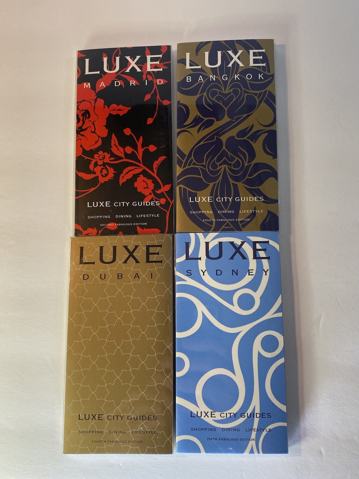 Luxe City Guides in Box, set of 12 in black flocked on white bkgd Travel Gift
