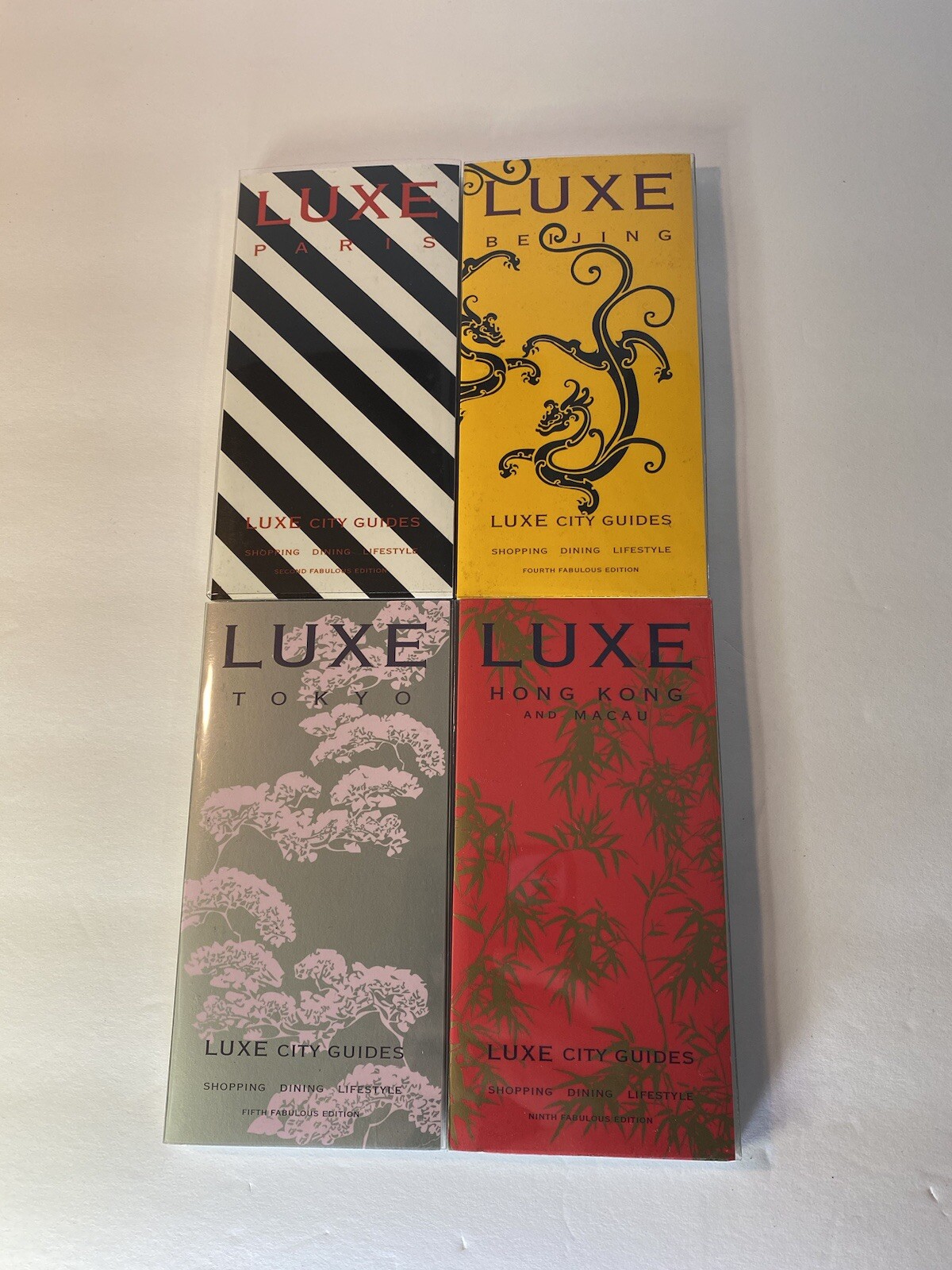 Luxe City Guides in Box, set of 12 in black flocked on white bkgd Travel Gift
