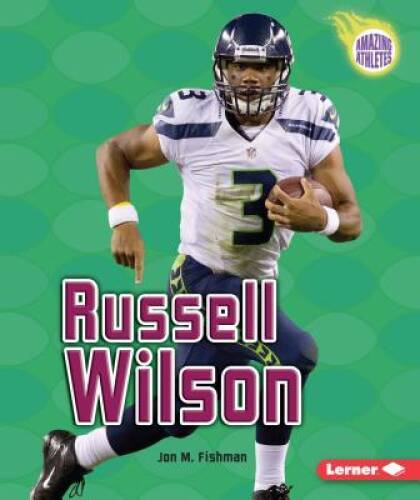 Russell Wilson (Amazing Athletes) – Paperback By Jon M. Fishman – GOOD